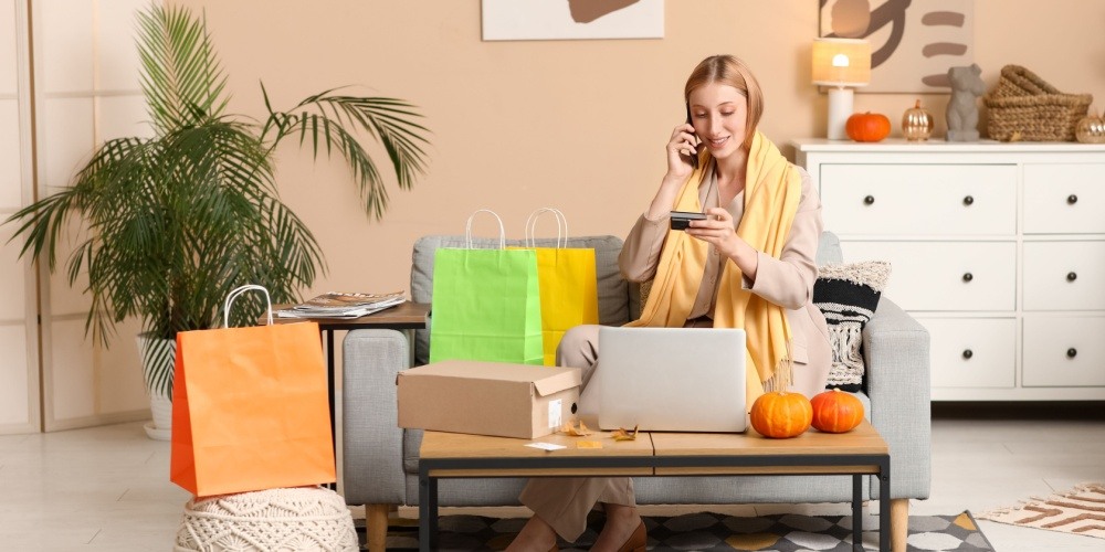 Happy customer on phone with her bank. 