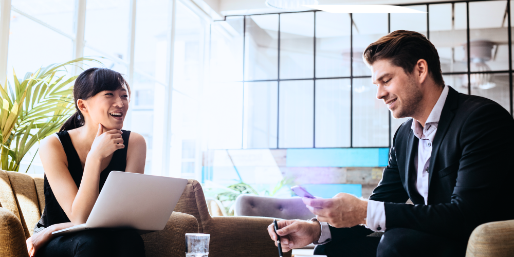 Banker helping customer with financial paperwork